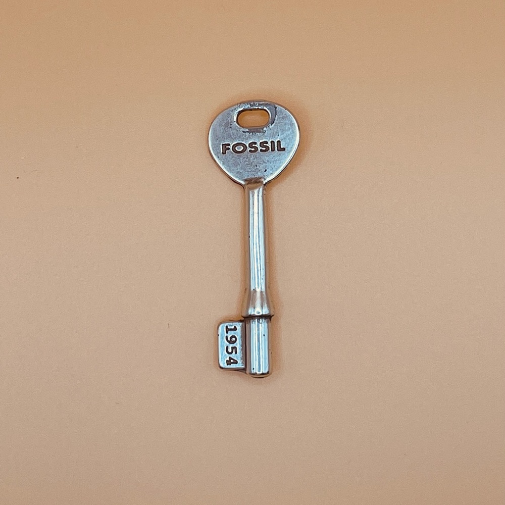 Fossil Silver Key Charm